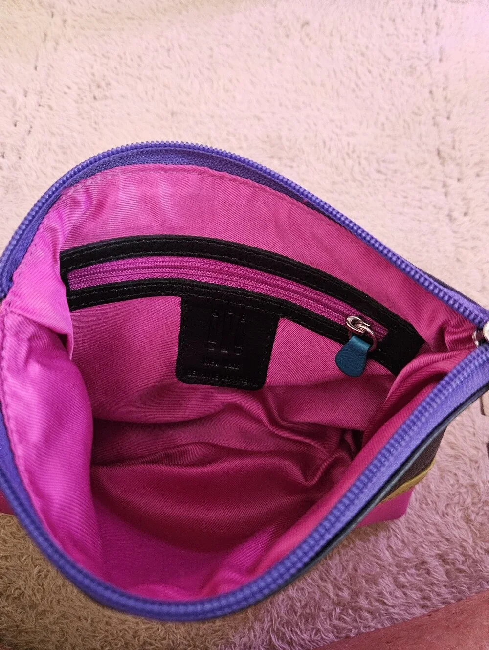 Ili New York Pink, black and Olive leather accessory bag